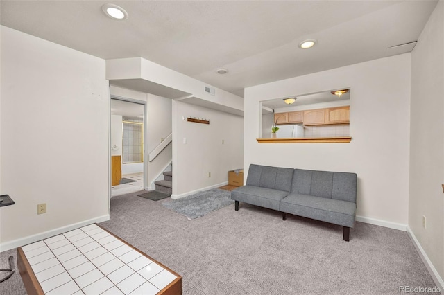 6868 Johnson St, Arvada, CO 80004 - living area with carpet floors, stairs, baseboards, and recessed lighting
