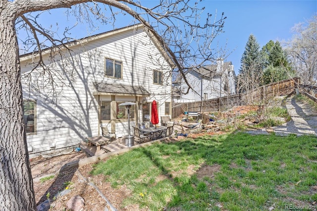 6868 Johnson St, Arvada, CO 80004 - rear view of property with a patio