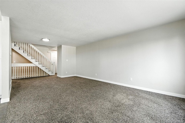 2976 S Parker Ct, Aurora, CO 80014 - empty room featuring stairs, dark colored carpet, and a textured ceiling
