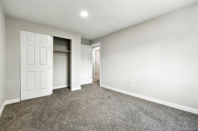 2976 S Parker Ct, Aurora, CO 80014 - unfurnished bedroom with dark colored carpet, a closet, and recessed lighting