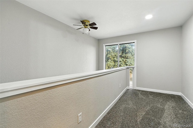 2976 S Parker Ct, Aurora, CO 80014 - empty room featuring dark colored carpet and ceiling fan
