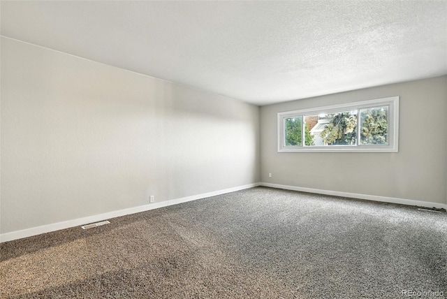 2976 S Parker Ct, Aurora, CO 80014 - spare room with carpet flooring and a textured ceiling