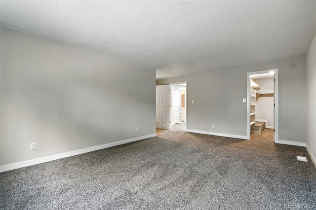 2976 S Parker Ct, Aurora, CO 80014 - spare room with carpet and a textured ceiling