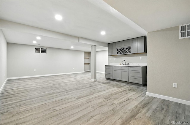 2976 S Parker Ct, Aurora, CO 80014 - indoor wet bar featuring light wood-type flooring and recessed lighting