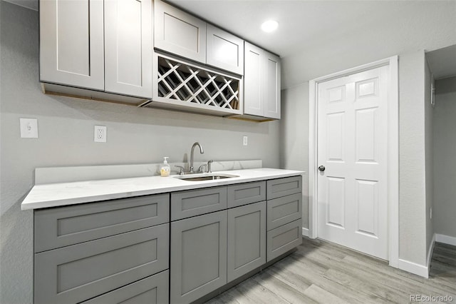 2976 S Parker Ct, Aurora, CO 80014 - indoor bar with light wood-type flooring and recessed lighting