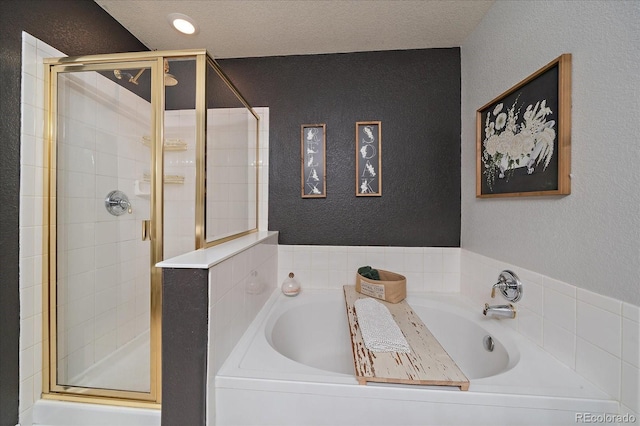 5107 Pasadena Way, Broomfield, CO 80023 - bathroom featuring a stall shower, a bath, and a textured wall