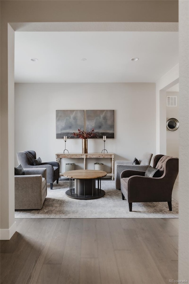 living room with hardwood / wood-style floors