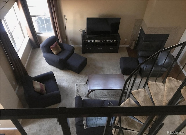 6711 S Ivy Way Unit B5, Centennial, CO 80112 - carpeted living room with baseboards and stairs