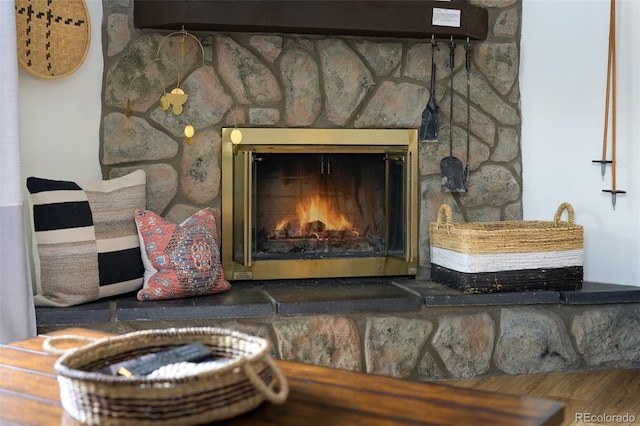 room details featuring a stone fireplace