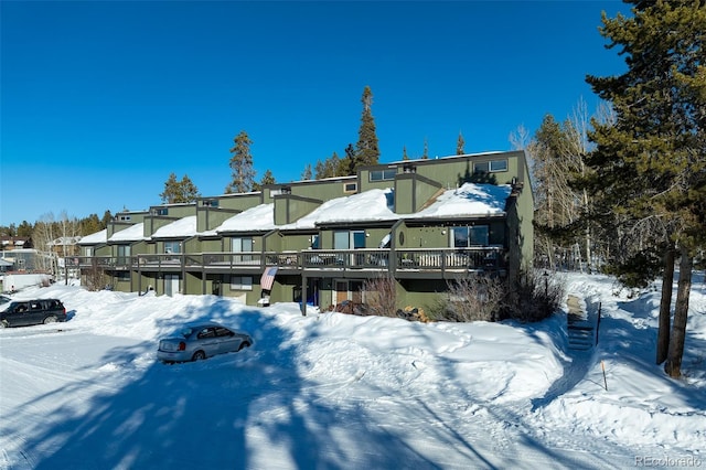 view of snow covered building