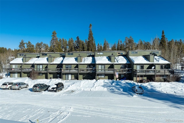 view of snow covered building