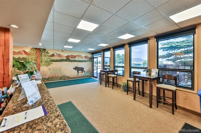 interior space featuring a paneled ceiling