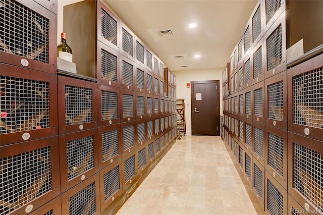 wine room with recessed lighting