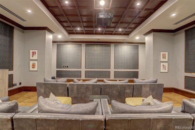 home theater room featuring baseboards, ornamental molding, and recessed lighting