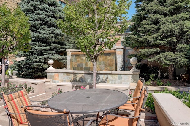 view of patio with outdoor dining area