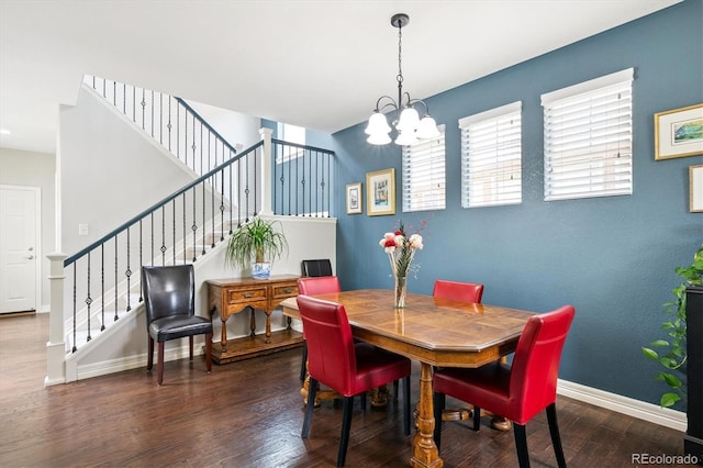 9311 E 5th Ave, Denver, CO 80230 - dining space with a chandelier, stairs, and wood finished floors