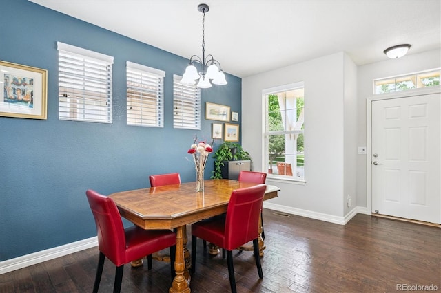 9311 E 5th Ave, Denver, CO 80230 - dining room with a chandelier and hardwood / wood-style floors