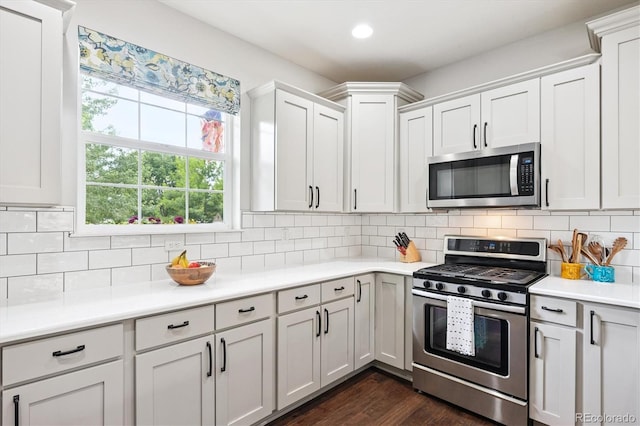 9311 E 5th Ave, Denver, CO 80230 - kitchen featuring stainless steel appliances, light countertops, tasteful backsplash, and recessed lighting