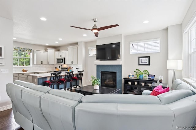 9311 E 5th Ave, Denver, CO 80230 - living area with a ceiling fan, a fireplace, recessed lighting, and dark wood finished floors