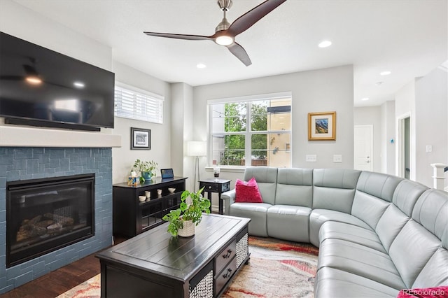 9311 E 5th Ave, Denver, CO 80230 - living room with a ceiling fan, wood finished floors, a glass covered fireplace, and recessed lighting