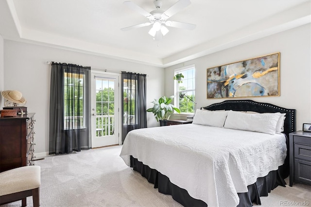 9311 E 5th Ave, Denver, CO 80230 - bedroom with a raised ceiling, light carpet, access to outside, and a ceiling fan