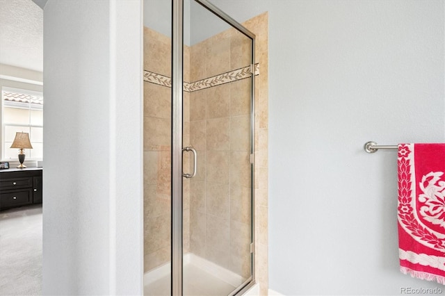 9311 E 5th Ave, Denver, CO 80230 - bathroom featuring a shower stall and vanity