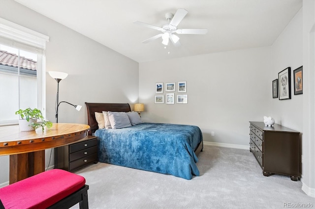 9311 E 5th Ave, Denver, CO 80230 - bedroom with light colored carpet and ceiling fan