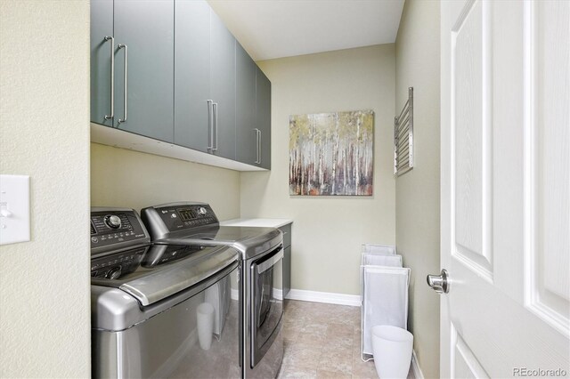 9311 E 5th Ave, Denver, CO 80230 - washroom with cabinet space and separate washer and dryer