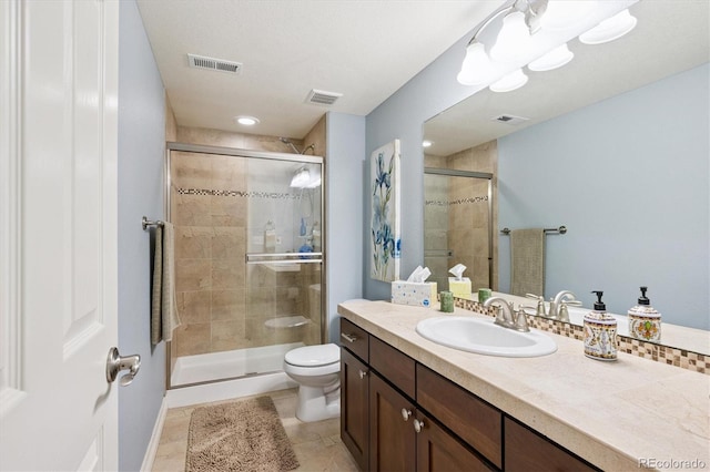 9311 E 5th Ave, Denver, CO 80230 - full bath featuring vanity, a stall shower, and tile patterned floors