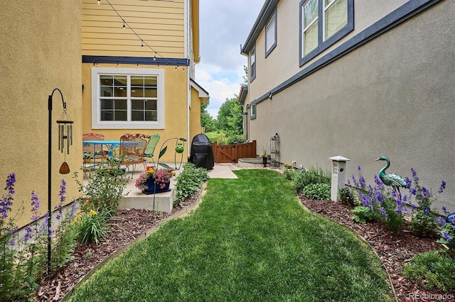 9311 E 5th Ave, Denver, CO 80230 - view of yard with a patio