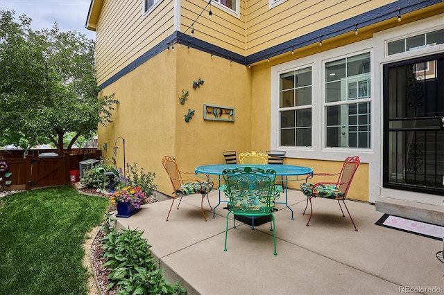 9311 E 5th Ave, Denver, CO 80230 - view of patio featuring outdoor dining space and a gate