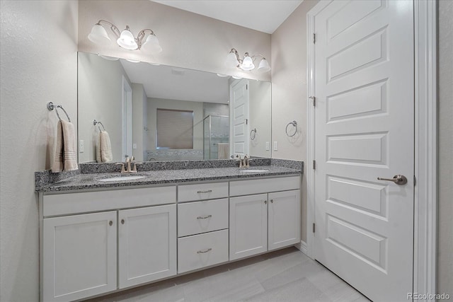 bathroom featuring vanity and walk in shower