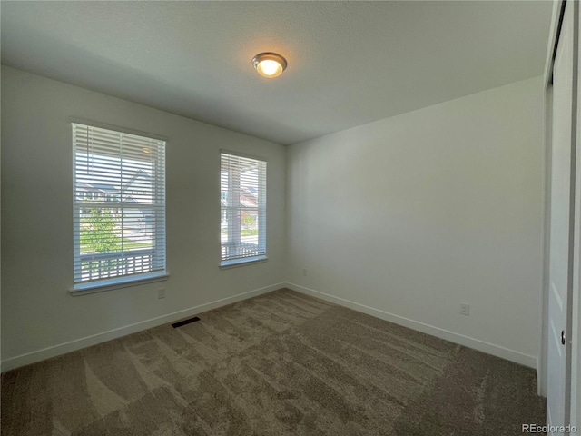 4598 Windmill Dr, Brighton, CO 80601 - empty room with baseboards and carpet floors