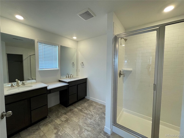 4598 Windmill Dr, Brighton, CO 80601 - full bath with a shower stall, two vanities, and recessed lighting