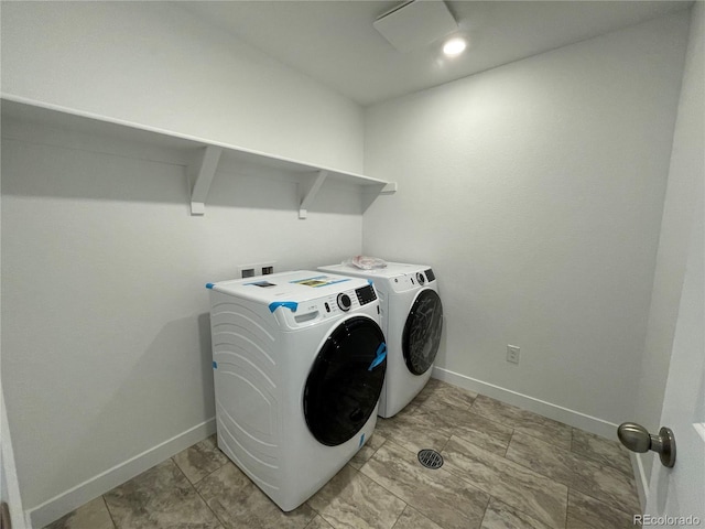 4598 Windmill Dr, Brighton, CO 80601 - washroom with washer and dryer and baseboards