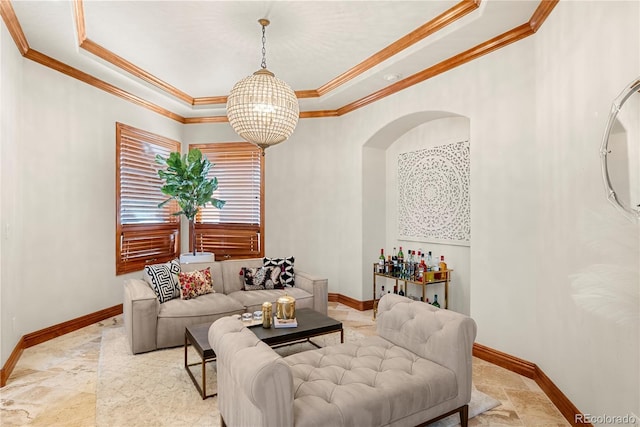 5350 S Marshall St, Littleton, CO 80123 - living room with a raised ceiling, ornamental molding, a chandelier, arched walkways, and baseboards