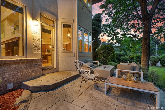 5350 S Marshall St, Littleton, CO 80123 - view of patio featuring an outdoor living space with a fire pit