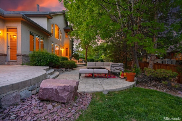 5350 S Marshall St, Littleton, CO 80123 - yard at dusk featuring a patio area and outdoor lounge area