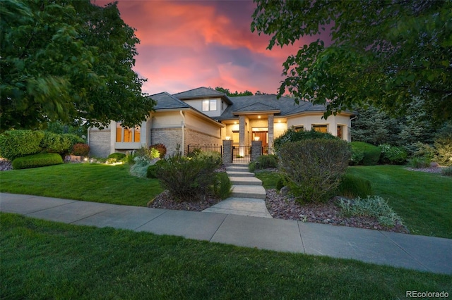5350 S Marshall St, Littleton, CO 80123 - view of front facade with a yard