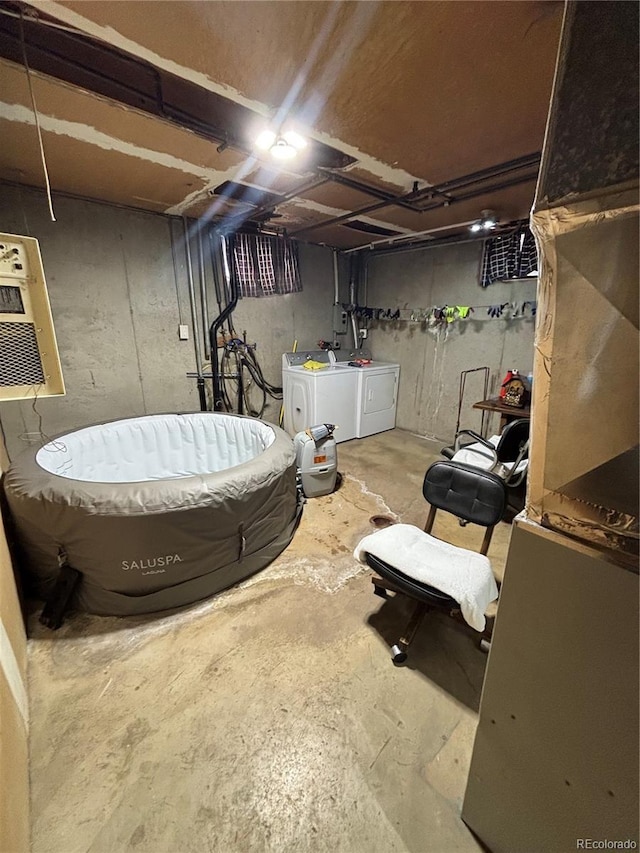 unfinished below grade area with washer and dryer