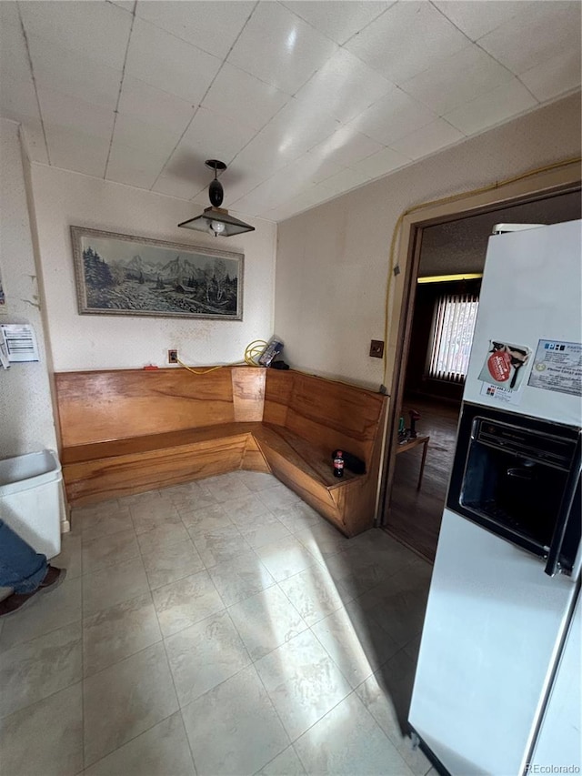 interior space featuring ceiling fan