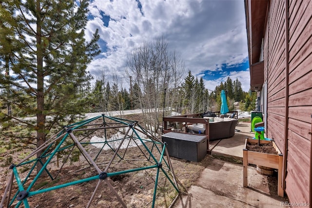 exterior space featuring a patio area and an outdoor living space