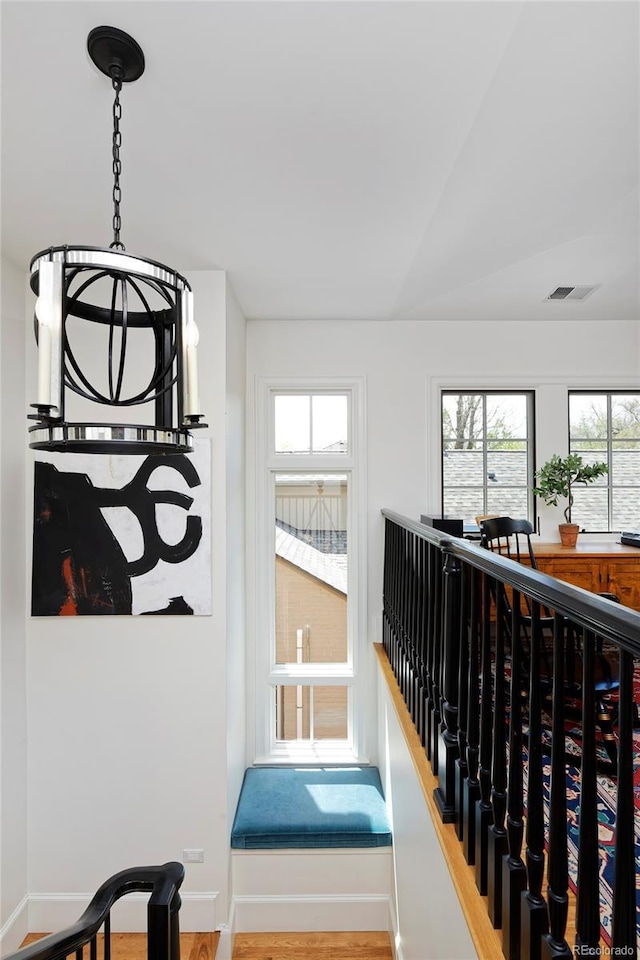 535 N High St, Denver, CO 80218 - interior space with healthy amount of natural light, baseboards, and wood finished floors