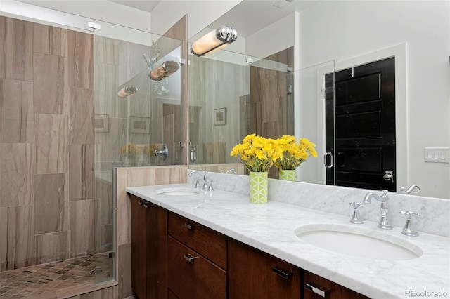 535 N High St, Denver, CO 80218 - full bath featuring a shower stall and double vanity