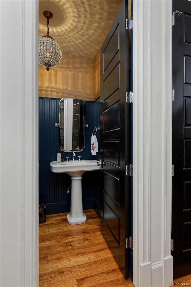 535 N High St, Denver, CO 80218 - bathroom featuring wood finished floors and a sink