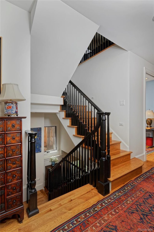 535 N High St, Denver, CO 80218 - staircase with wood finished floors and baseboards
