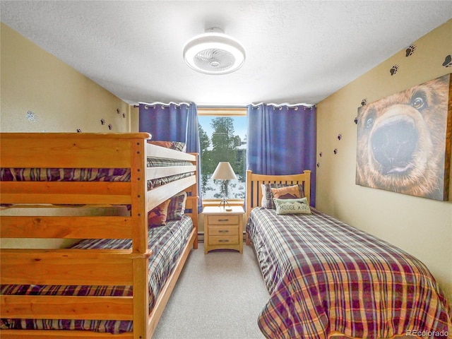 bedroom featuring a textured ceiling