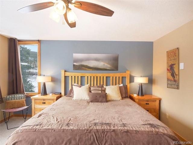 bedroom featuring carpet flooring and ceiling fan