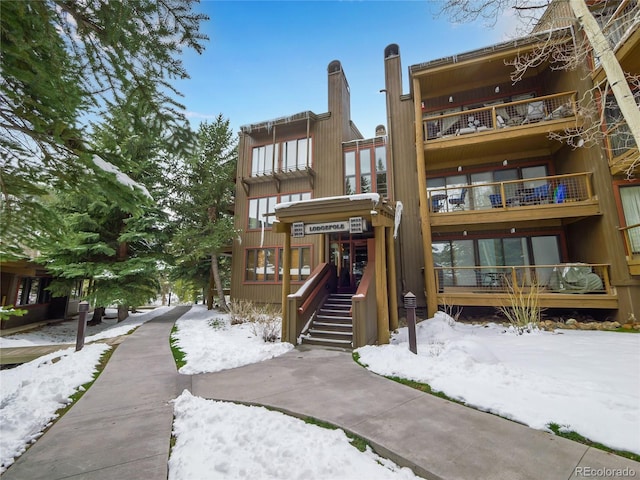 view of snow covered building