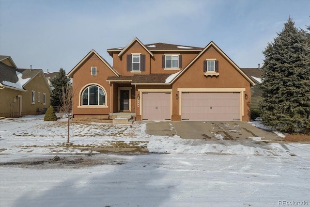 view of front of home with a garage